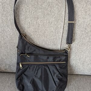 Stylish Black And Teal Crossbody Bag By Travelon With Attached Purse Light